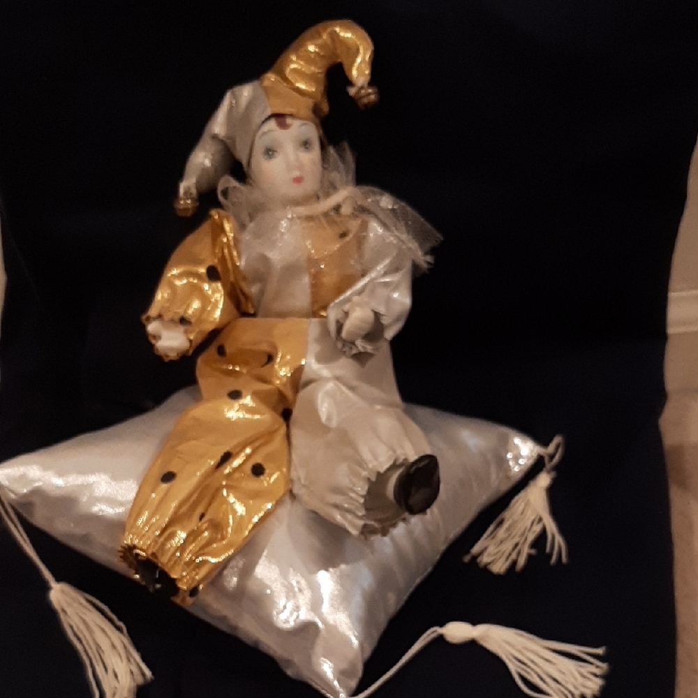 Gold and Silver Jester Doll on Pillow